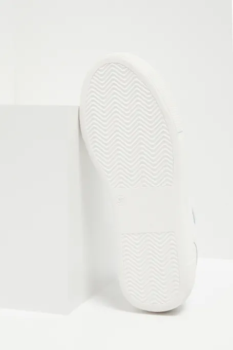 Białe skórzane sneakersy