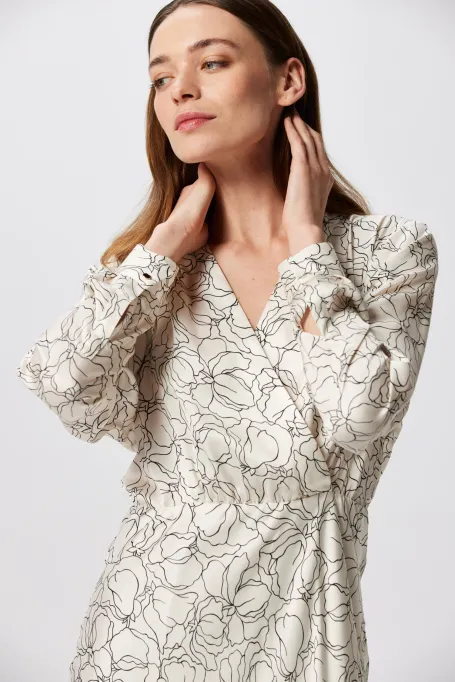 Biała sukienka w linearny deseń Biała sukienka w linearny deseń