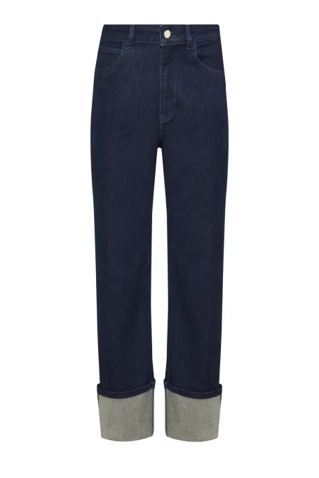 Granatowe jeansy z szerokim mankietem