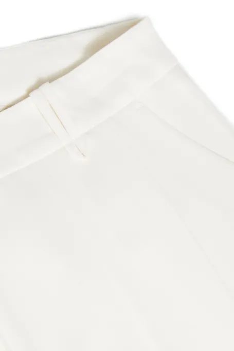 Białe spodnie Lotto do garnituru