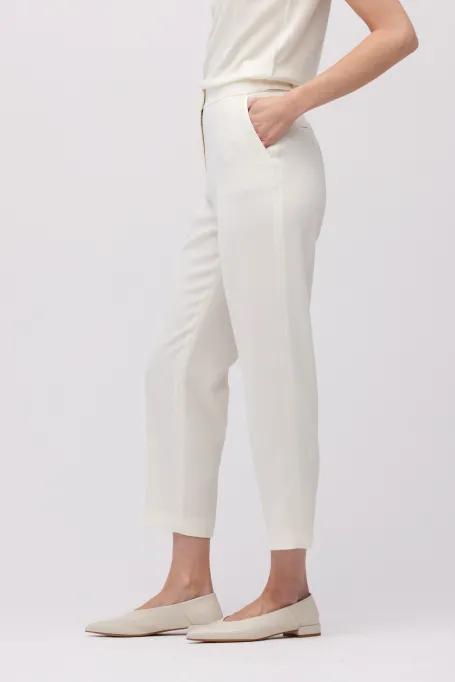 Białe spodnie Lotto do garnituru