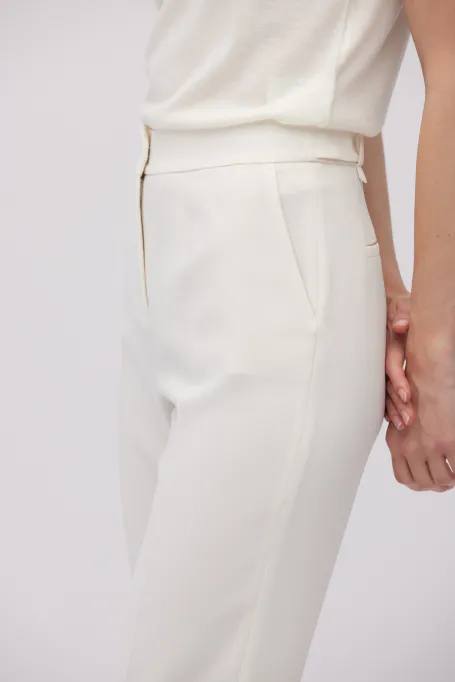 Białe spodnie Lotto do garnituru