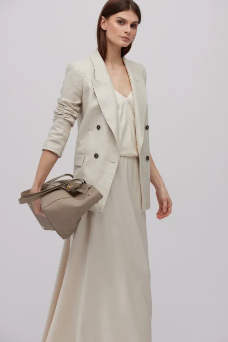 Długa beżowa spódnica z rozcięciami