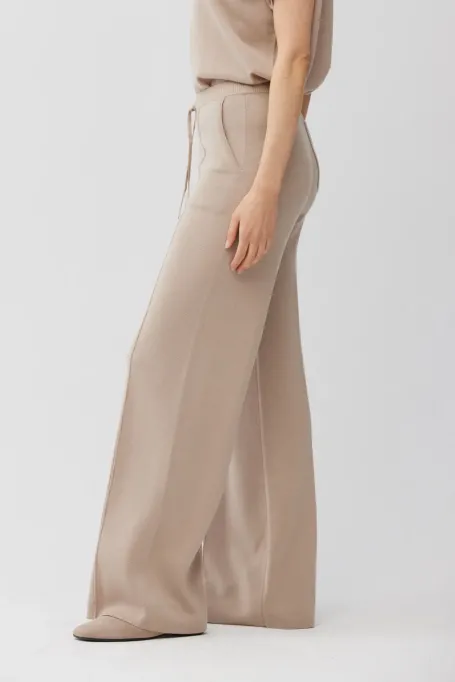 Szerokie beżowe spodnie z wełny czesankowej