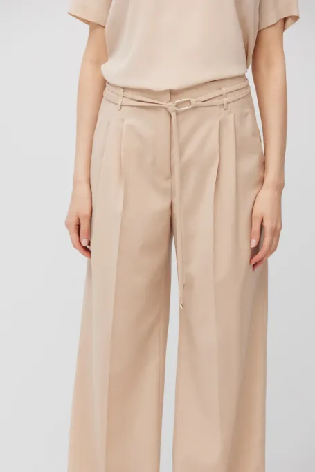 Spodnie z wełny dziewiczej w pudrowym różu